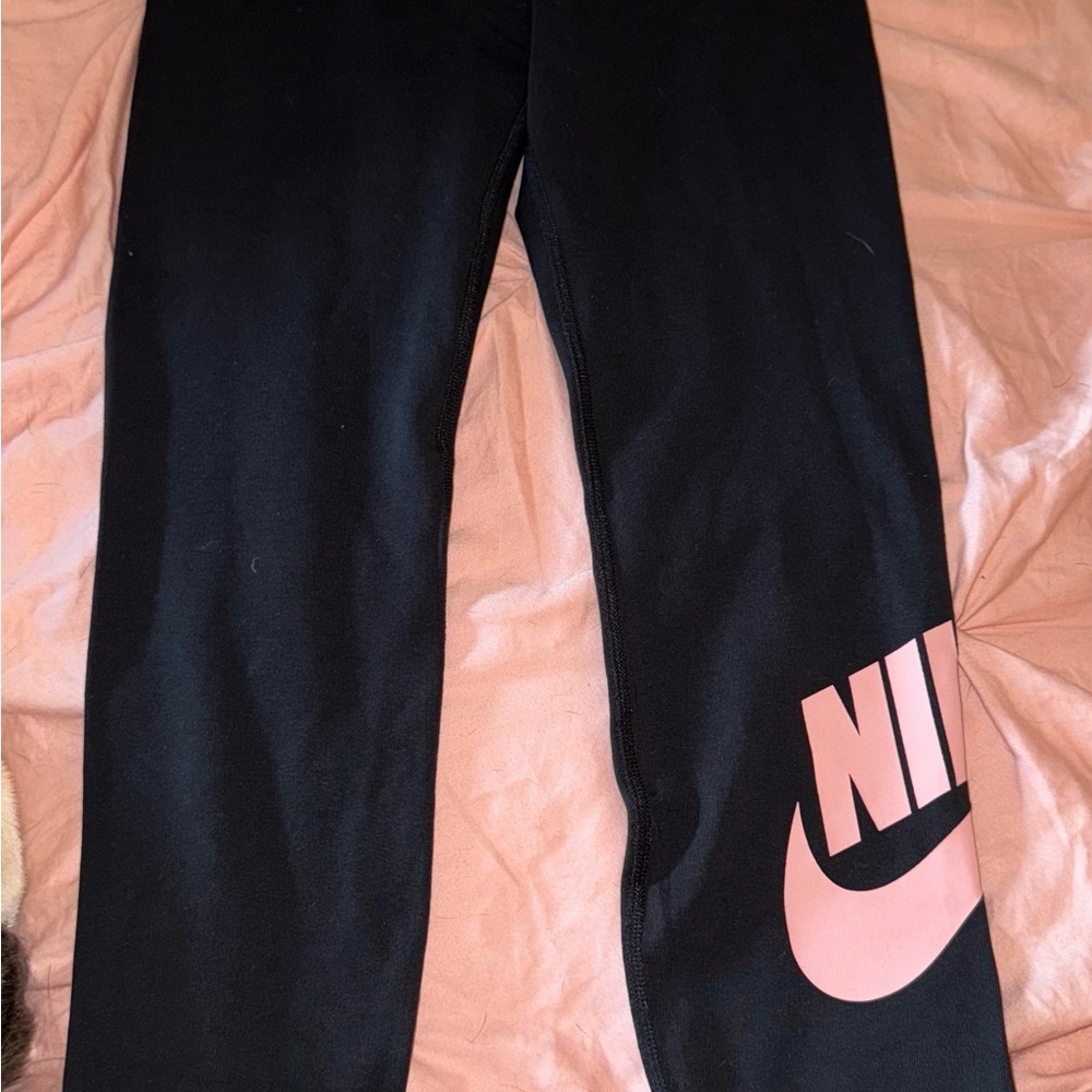 Womens Nike tight fit high rise full length black leggings with pink logo/ Nike